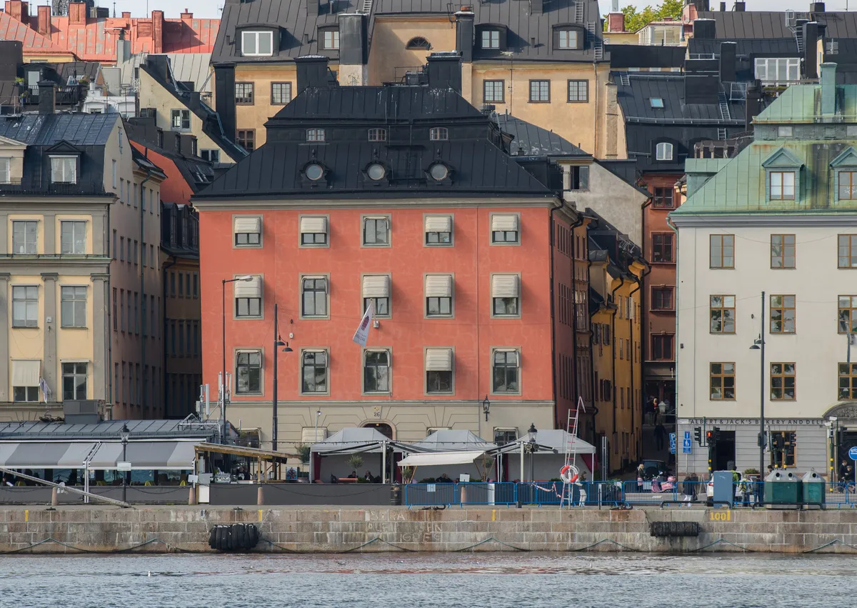 Painted merchant houses along the Skeppsbron quay in Gamla stan, Stockholm's old town