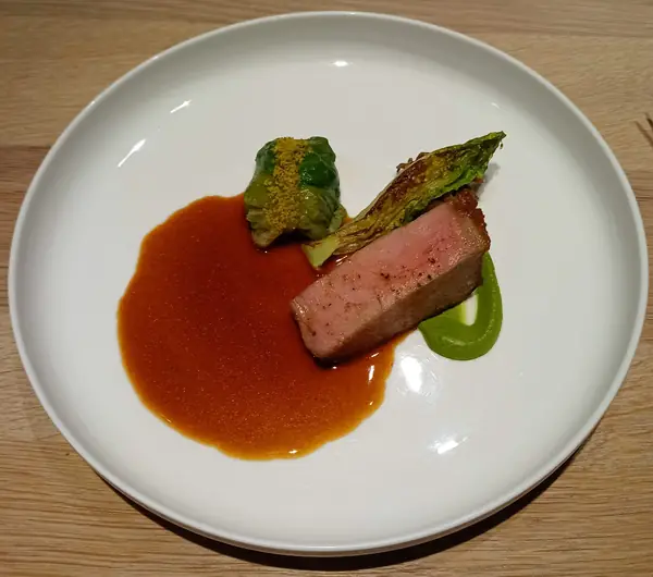 Black pork with pistachio and chanterelles, a course at EPUR, Lisbon